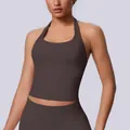Detail view of a chocolate brown seamless halter neck sports bra for yoga and fitness. - Chocolate Brown