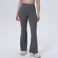 Detail showing high-waisted charcoal grey flare yoga pants for fitness and running - S / Bottoms / Graphite Grey