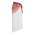 Detail view of ethnic style red patterned wrap skirt with long white fringe tassels - One Size / Bottoms