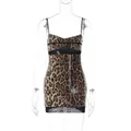 Detail view of leopard print sequined mini dress with sheer mesh stitching. - S / Top And Bottom / Leopard Print