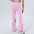 High-waisted pink flared yoga pants showing breathable stretch fabric and supportive fit - S / Bottoms / Sakura Pink