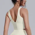 Ivory high-intensity solid color sports bra with deep V-back design for yoga and fitness - S / Tops / Light Ivory