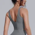 Reggiseno sportivo grigio ad alto impatto con profondo scollo a V sulla schiena. - Taglia S / Top / Grigio titanio
