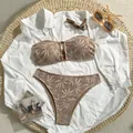 Flat lay of a crochet high-waisted bikini set with leaf pattern and resort accessories - S / Top And Bottom / Two-Piece Set / Light Coffee