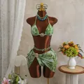 Detailed view of tie-dye green three-piece bikini set with mesh sarong and gold rings - S / Top And Bottom / Green