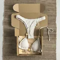 White textured bikini set with yellow beaded detail inside a kraft packaging box - S / Top And Bottom / Apricot