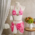 Detail view of stylish 3-piece pink tie-dye bikini set with mesh sarong on mannequin. - S / Top And Bottom / Pink