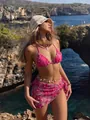 Close-up of pink floral embroidered sequin bikini set with mesh sarong skirt - S / Top And Bottom / Rose Red