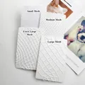 Detailed comparison of four different mesh sizes for sexy white fishnet pantyhose for women. - Medium Large Mesh / White