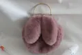 Cute pink faux fur plush handbag with decorative rabbit ears and golden metal handle - Dark Mauve