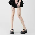 Elegant sheer star print pantyhose featuring black pentagram pattern for women - One Size (45-80kg) / Nude with Irregular Stars