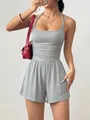 Close-up of grey ribbed halter neck romper showing the cinched waist and soft fabric - XS / Top And Bottom / Light Gray