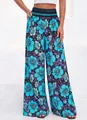 Detailansicht der High-Waist-Hose mit weitem Bein und lebhaftem floralem Print. - S / Unterteile / Schwarz Blaues Blumenmuster