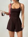 Stylish sleeveless halter neck romper with smocked waist in dark brown for summer - Coffee