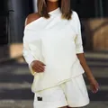 Trendy white off-shoulder sweatshirt and shorts set for women in a relaxed loose fit - S / Top And Bottom / White