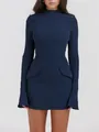 Detailed view of a navy blue long-sleeved high-neck mini dress with flap pockets. - S / Top (240886) / Navy Blue