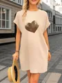 Close-up view of the golden sequin heart embroidery on a beige casual short sleeve dress - S / Top And Bottom / Apricot