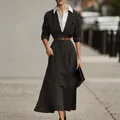 Elegant retro black and white striped shirt dress with contrast collar and brown belt - S / Tops / Striped