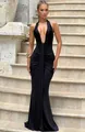 Detailed view of elegant black halter deep V-neck evening gown with ruched waist pleats - S / Black