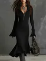 Detailed view of black ribbed knit mermaid dress with zipper lapel and flared bell sleeves - S / Black