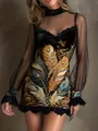 Detailed view of the black bodycon dress with lace trim and peacock feather prints. - S / Dresses / Feather