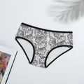 Floral print milk silk women's panties flat lay detail on a white studio surface - S / White Black Floral