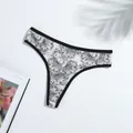 Detail shot of breathable floral print milk silk thong with black elastic waistband - XL / Bottoms / White Black Floral