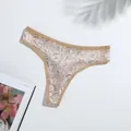 Macro view of floral print milk silk thong for women featuring soft breathable fabric - XL / Bottoms / Nude Gray Floral