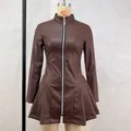 Detailed view of a brown faux leather dress featuring a pleated skirt and front zip. - S / Top And Bottom / Brown