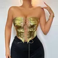 Close-up of a sexy gold metallic lace-up corset top for women with a shiny finish. - S / Tops / Gold