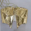 Detail of gold metallic lace-up corset top with shiny finish and grommets - S / Tops / Gold