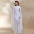 Elegant white slim-fit dress featuring dramatic cape sleeves and a pleated mesh hem detail. - S / Top And Bottom / White