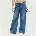 Vista detallada de vaqueros de pierna ancha para mujer con lunares blancos en denim azul - S / Bottoms / Azul