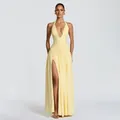 Elegant light yellow halter neck evening dress with high slit and ruched waist detail. - S / Yellow