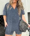 Model wearing a charcoal acid-wash V-neck t-shirt and matching high-waisted biker shorts. - S / Top And Bottom / Slate Gray