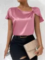 Detail of pink satin blouse showing the shoulder knot design and silky fabric texture - Pink