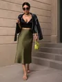 Elegant olive green satin midi skirt featuring a high waist and sleek mermaid cut silhouette - S / Bottoms / Army Green