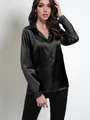 Elegant black satin long sleeve blouse featuring a silky loose fit and single button - Black
