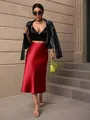 Elegant red satin midi skirt for women featuring a high waist and glossy silk finish - S / Bottoms / Red