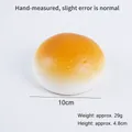 PU slow-rebound golden bun squishy toy with realistic bread texture - 10cm Flat Bun - Bread Color (with Bread Buckle)