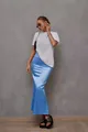 Elegant light blue satin fishtail skirt worn by a model in a minimalist setting. - S / Bottoms / Sky Blue