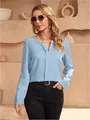 Elegant light blue satin long sleeve blouse for women featured in a minimalist setting - XS / Tops / Light Blue