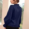 Elegant navy blue satin long sleeve blouse featuring ruffled collar and elastic cuffs - XS / Tops / Dark Blue
