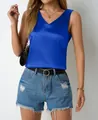 Detail view of an elegant blue V-neck satin tank top featuring a smooth silk texture finish - Blue
