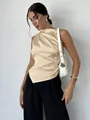 Elegant minimalist champagne sleeveless satin shirt with asymmetrical draped hem for women - XS / Top (A0106) / Apricot