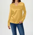 Elegant women's yellow satin long-sleeve blouse with V-neckline shown on model - Yellow