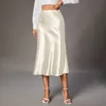Elegant champagne white satin midi skirt featuring a silky high-waisted design for women - Apricot