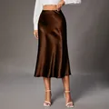 Elegant dark brown satin midi skirt with a high-waisted luxurious silk-like finish - S / Bottoms / Brown