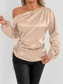 Close-up of champagne satin one-shoulder long sleeve blouse with side drawstring - Apricot