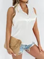 Detailed view of stylish white sleeveless satin shirt for women with button closure - S / Tops / White